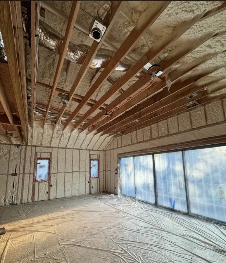 Interior walls and ceiling insulated with spray foam during new construction in Helena